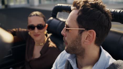 couple enjoying a car ride