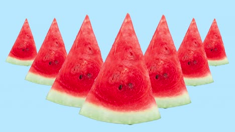 muchas rebanadas de sandía roja animadas sobre un fondo azul. bucle sin costuras de comida 3d realista. patrón creativo con comida saludable