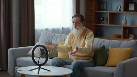senior man doing a video call at home