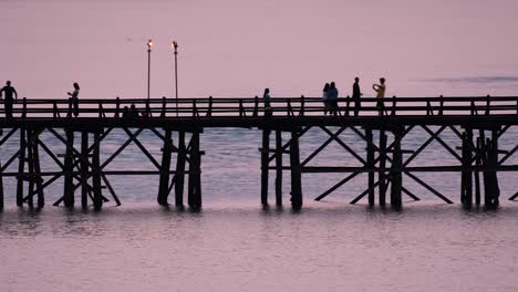 The-Mon-Bridge-is-an-old-wooden-bridge-located-in-Sangkla,-Thailand