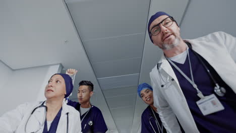 pov, doctors and team push patient for emergency