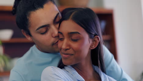 Cheek,-kiss-and-couple-in-embrace-with-love