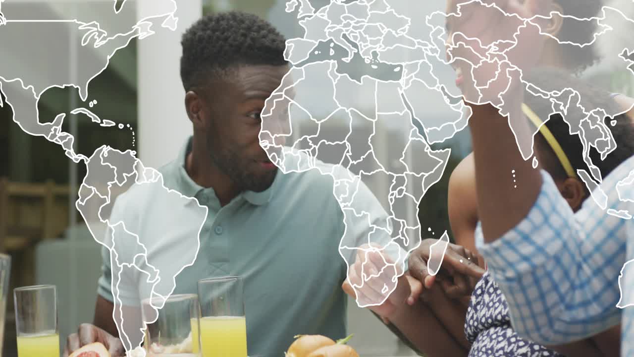 Dad showing map on phone, child reaching during patio meal, tech map overlay growing over family