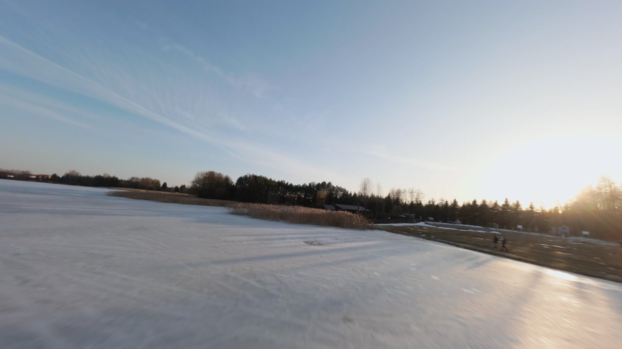 Winter landscape of icy lake in Masurian Lake District
