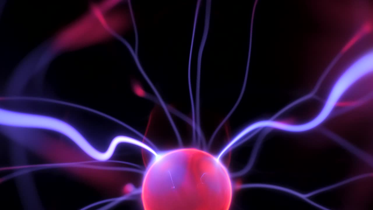 un primer plano de una corriente de plasma azul y roja moviéndose