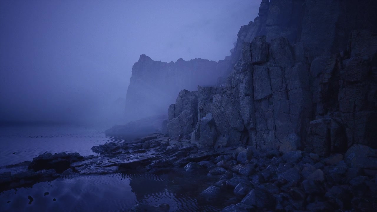 Vertical layers and deep fissures create dramatic shadow play at sunset