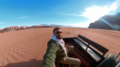 riding in the back of a jeep in the wadi rum desert