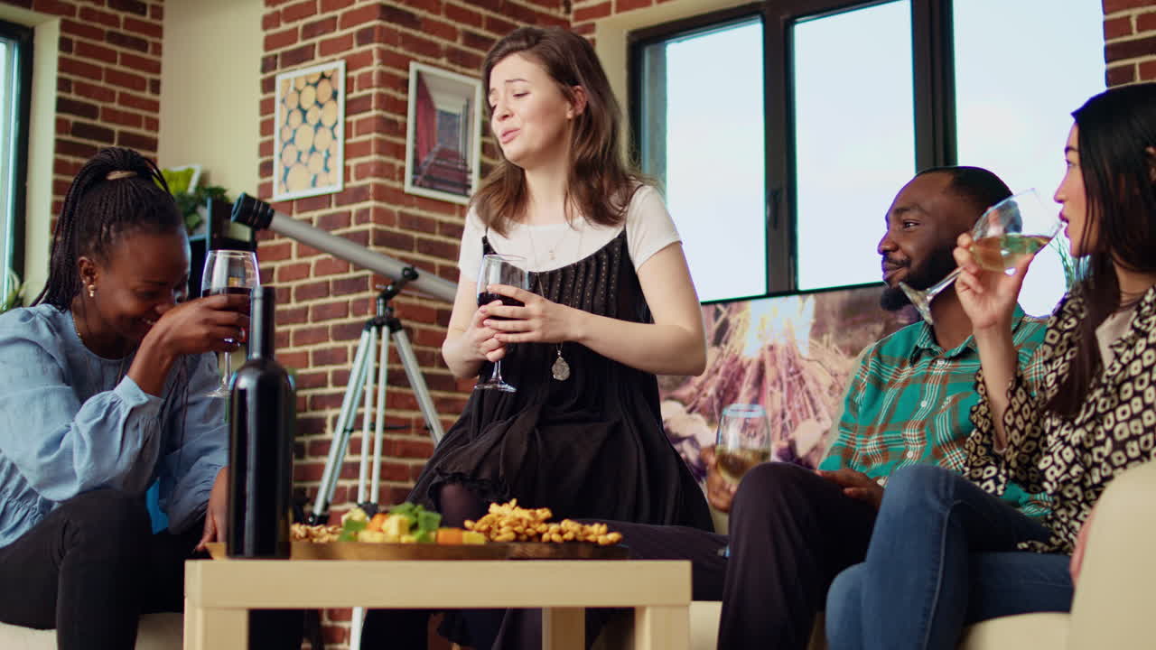 Woman telling entertaining story to apartment party guests, gossiping about annoying friend