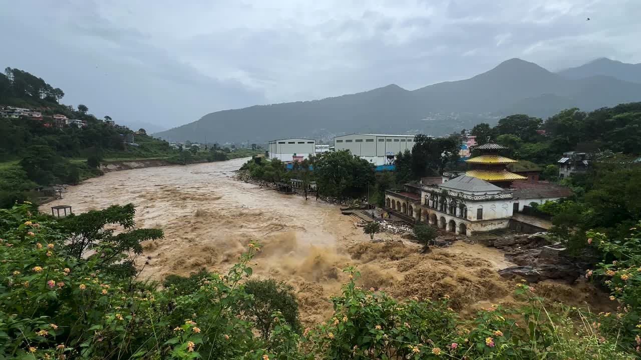 The Bagmati River flooded and affected the riverbanks and homes during heavy rainfall in Kathmandu, Nepal