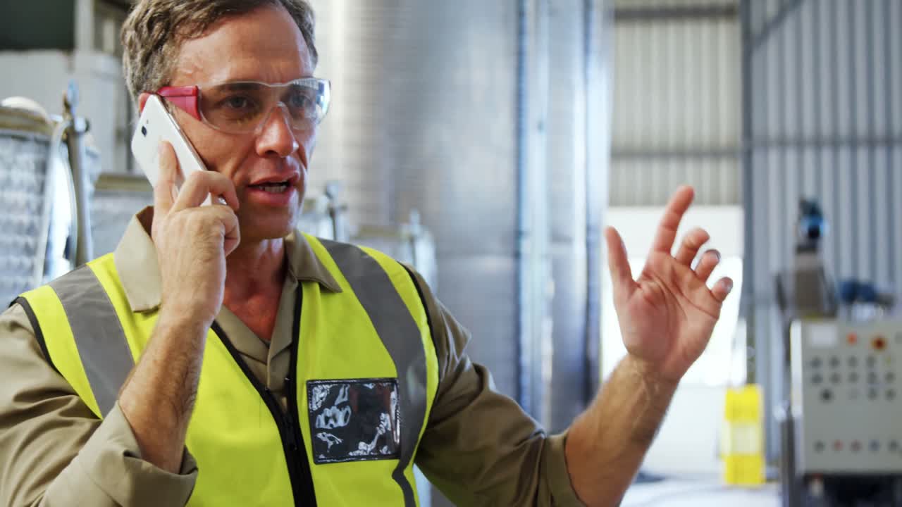 Worker talking on mobile phone