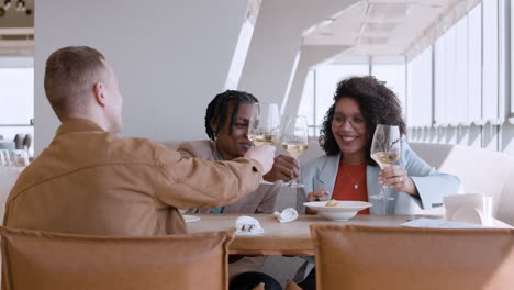 friends celebrating in a modern restaurant
