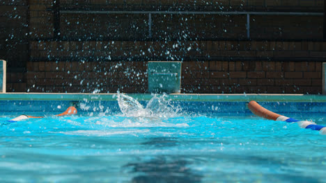 female swimmer swimming inside pool 4k