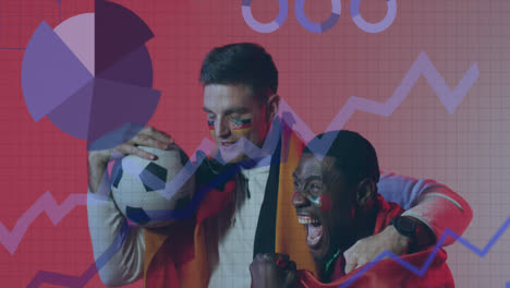 animation of charts on interface over cheering diverse male football fans with scarf, ball and flag