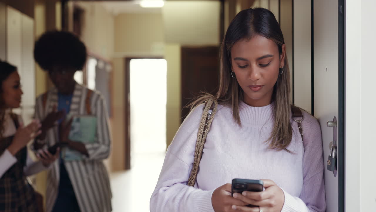 Phone, bullying and gossip with woman in college