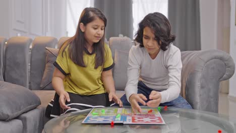 indian kid boy scraps the ludo game when sister is about to win