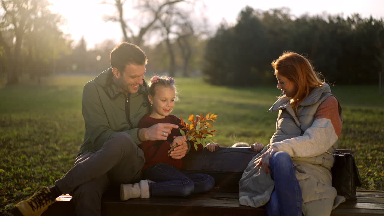 Family enjoying autumn in the park