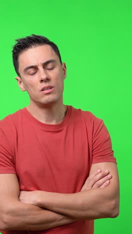 Man expressing frustration on green screen