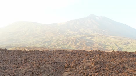 tilt up from ground reveals national park of teide mars like landscape