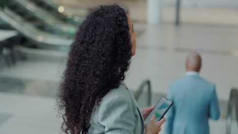 escalator, thinking and business woman with phone