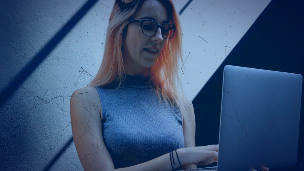 Young Woman Working on Laptop with Digital Network Overlay