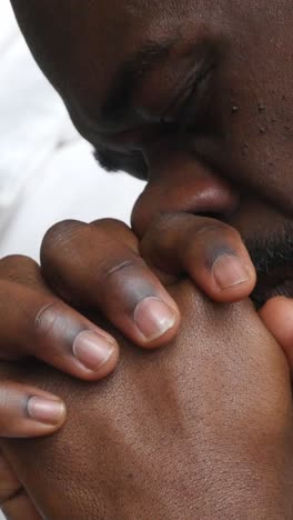 black african american christian man in deep prayer