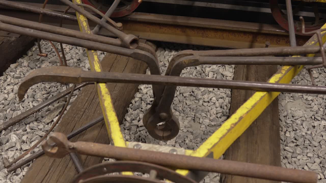 Camera pan across a vintage rail bike at Flåm Railway Museum, Norway, showcasing early track inspection design and industrial heritage