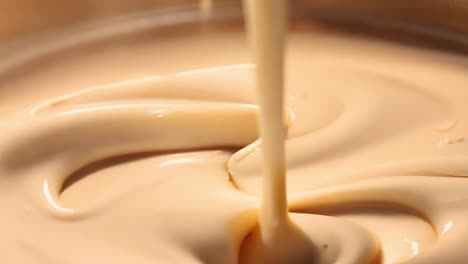 close up of cream being poured