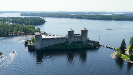 panoramic drone shot circling the st. olaf's castle, in sunny savonia, finland
