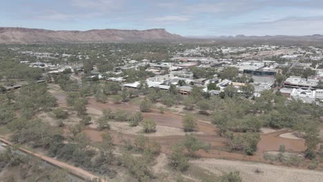 Buildings At Remote Town Of Alice Springs With Todd River - Tjoritja, MacDonnell Ranges In Northern Territory, Australia. - aerial