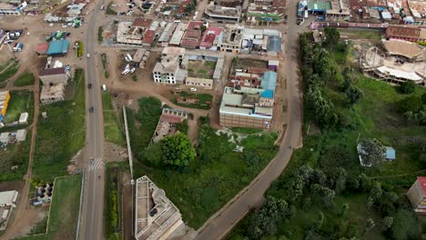 city scape-drone view-cars moving on the road in small village of loitokitok kenya