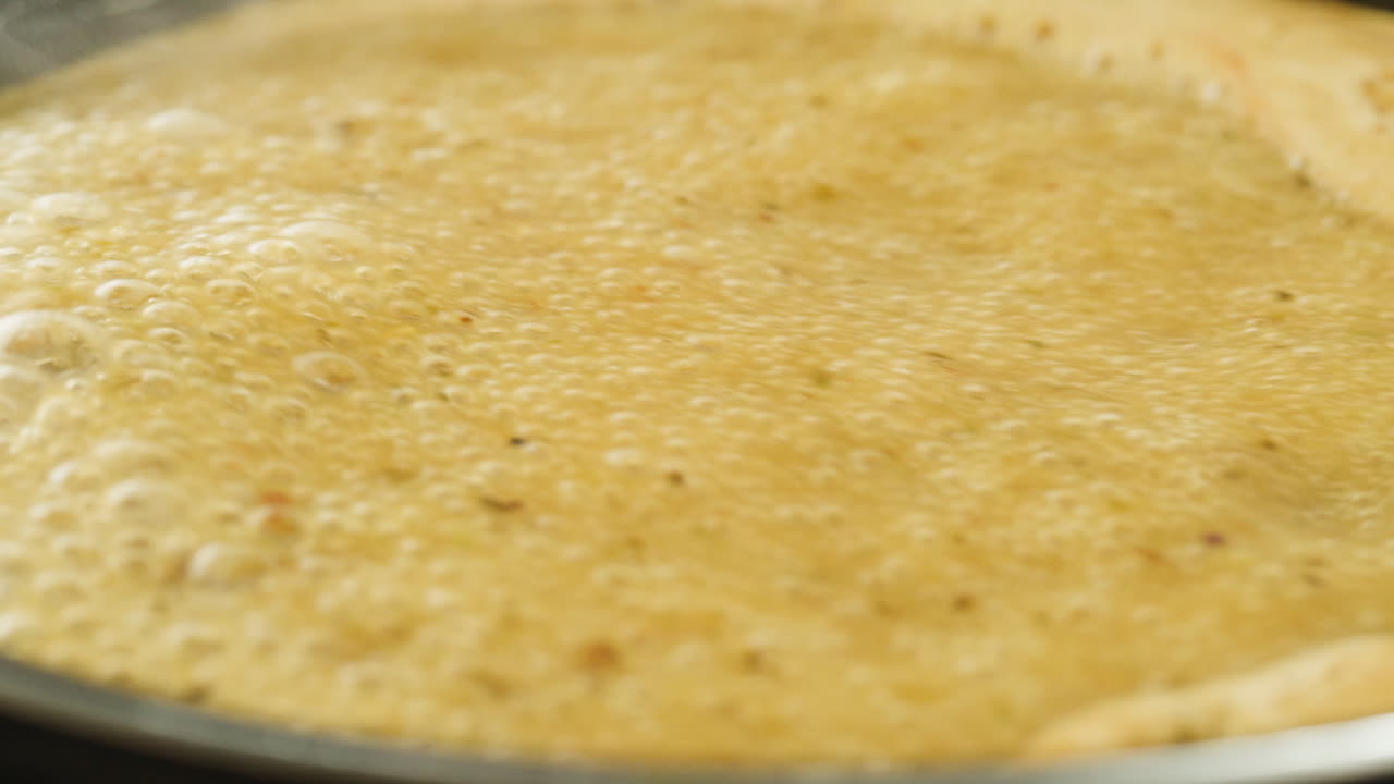 Cooking Pizza Sauce in a Pan