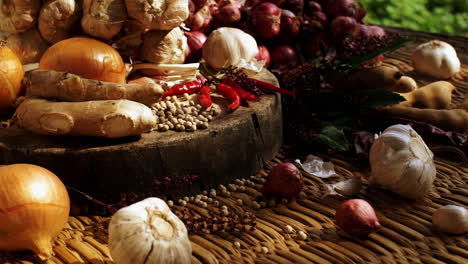 south east asian seasoning spices and herbals ingredients for making hot and spices food varieties arranged beautifully on a wooden cutting board on a kitchen table in an afternoon sunlight