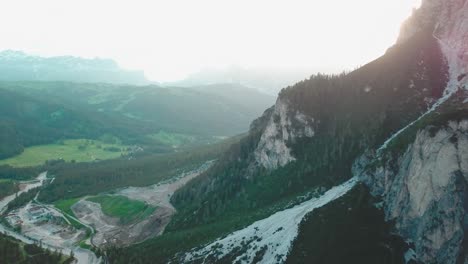 Forward-aerial-shot-in-the-Alps-of-mountains-and-rocky-cliffs