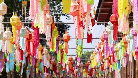 vibrant lanterns hanging in a festive outdoor setting