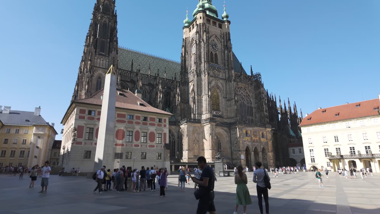 Establishing shot of St. Vitus Cathedral in Prague, Czechia, capturing its Gothic architectural design and cultural significance