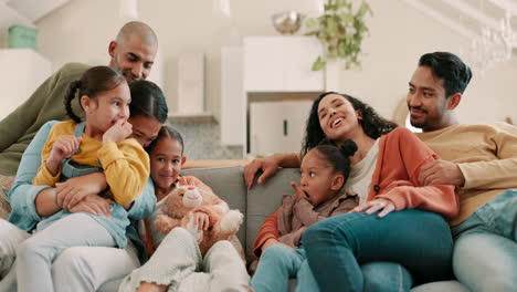 Happy,-big-family-on-sofa-and-in-living-room