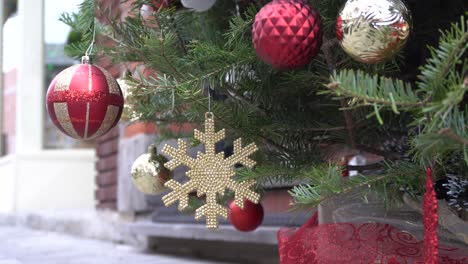 a close-up view of a christmas eve that is moving with the effect of the wind