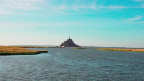 mont-saint-michel surrounded by the sea during high tide