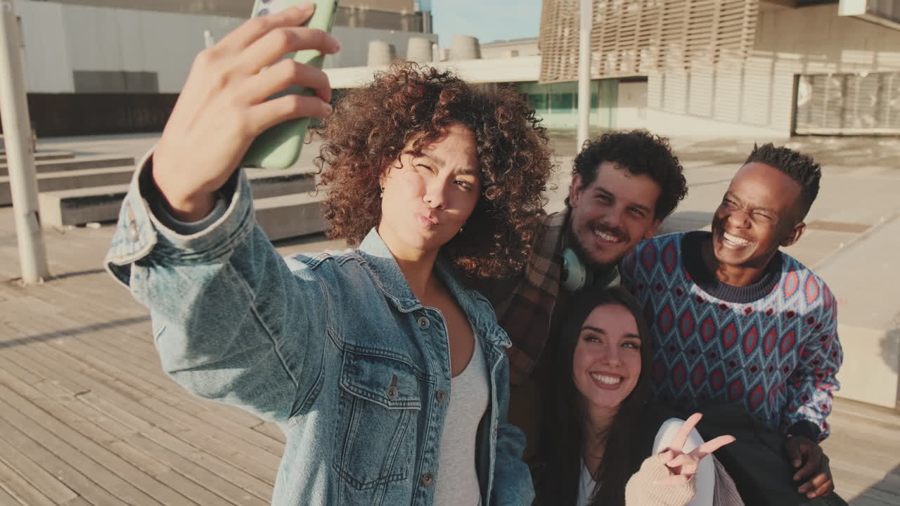 Group selfie with friends in the city