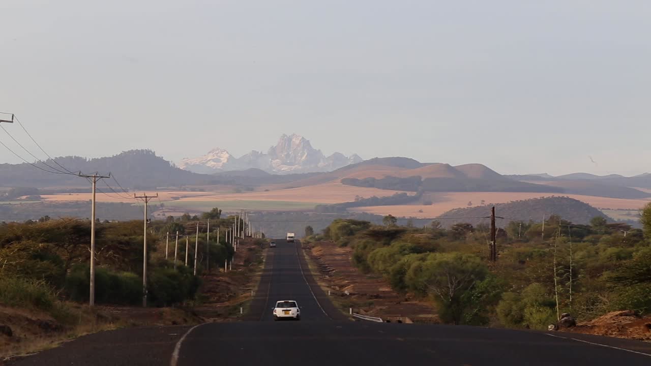 Scenic view of Mt Kenya peaks and highlands from the Isiolo - Meru Highway.