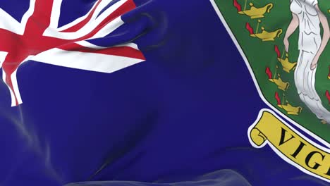 flag of the british virgin islands waving at wind with blue sky, loop