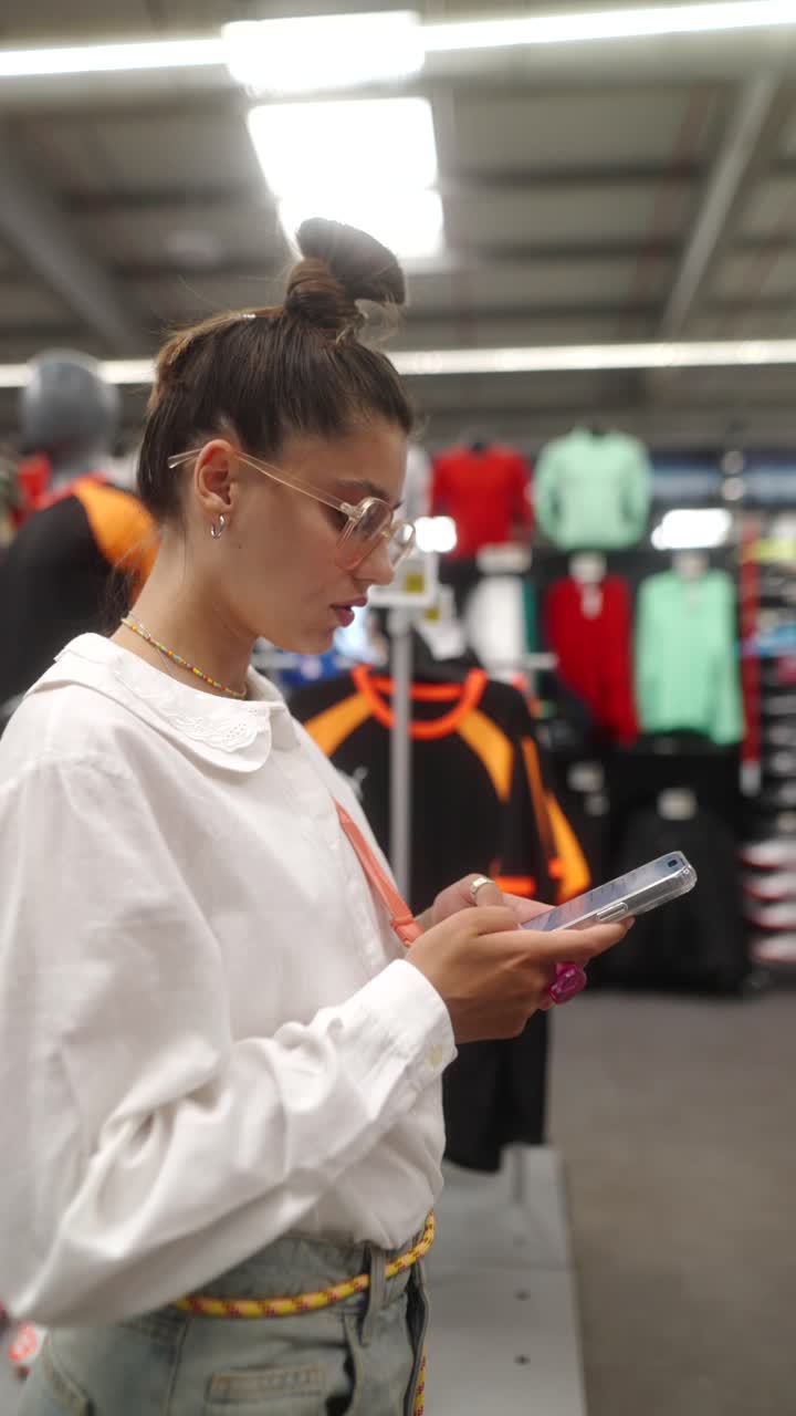 Woman shopping in a sports store
