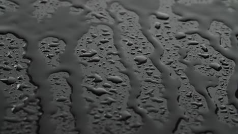 video of rainy drops on black background