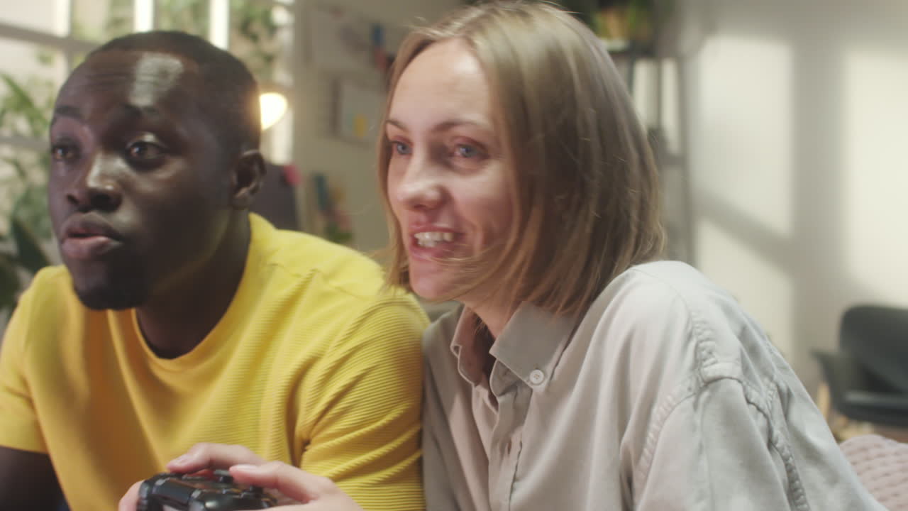 A diverse man and woman interacting in a home setting