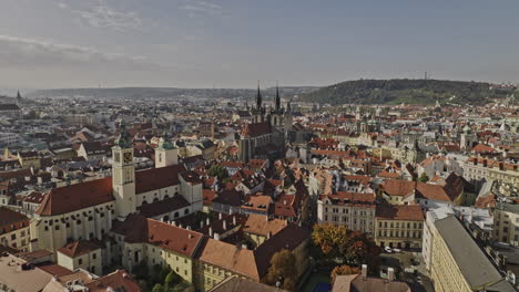 prague czechia aerial v115 drone flyover church of our lady before týn between gothic spires twin towers across old town square capturing historic cityscape - shot with mavic 3 cine - november 2022