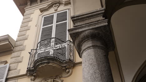 ornamental balcony and window detail of a historic building