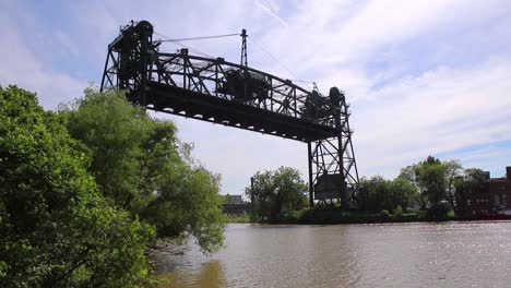 cuyahoga river bridge spanning over the water on a blue sky day