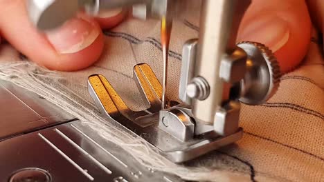 sewing a teared pocket on pants with sewing machine