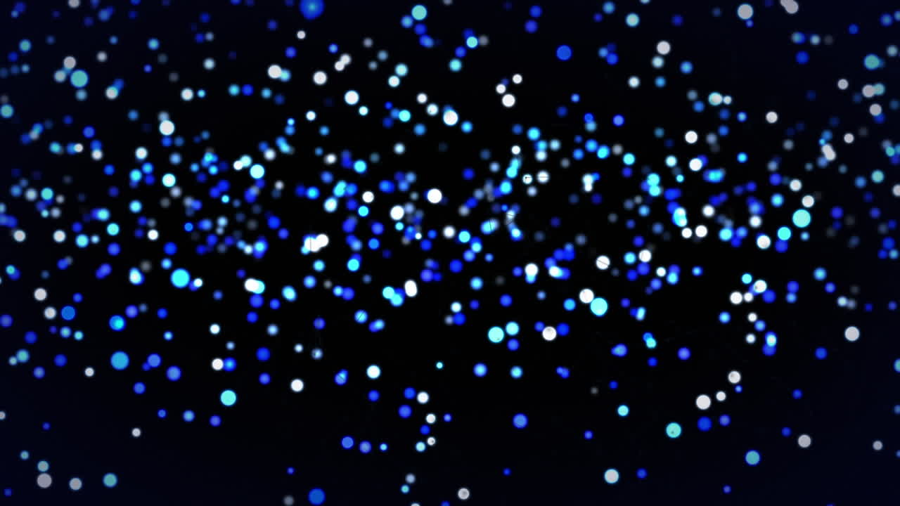 검은 바탕에 떠오르는 파란색과  ⁇ 색의 빛 반점의 애니메이션