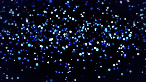 animation of blue and white light spots rising on black background